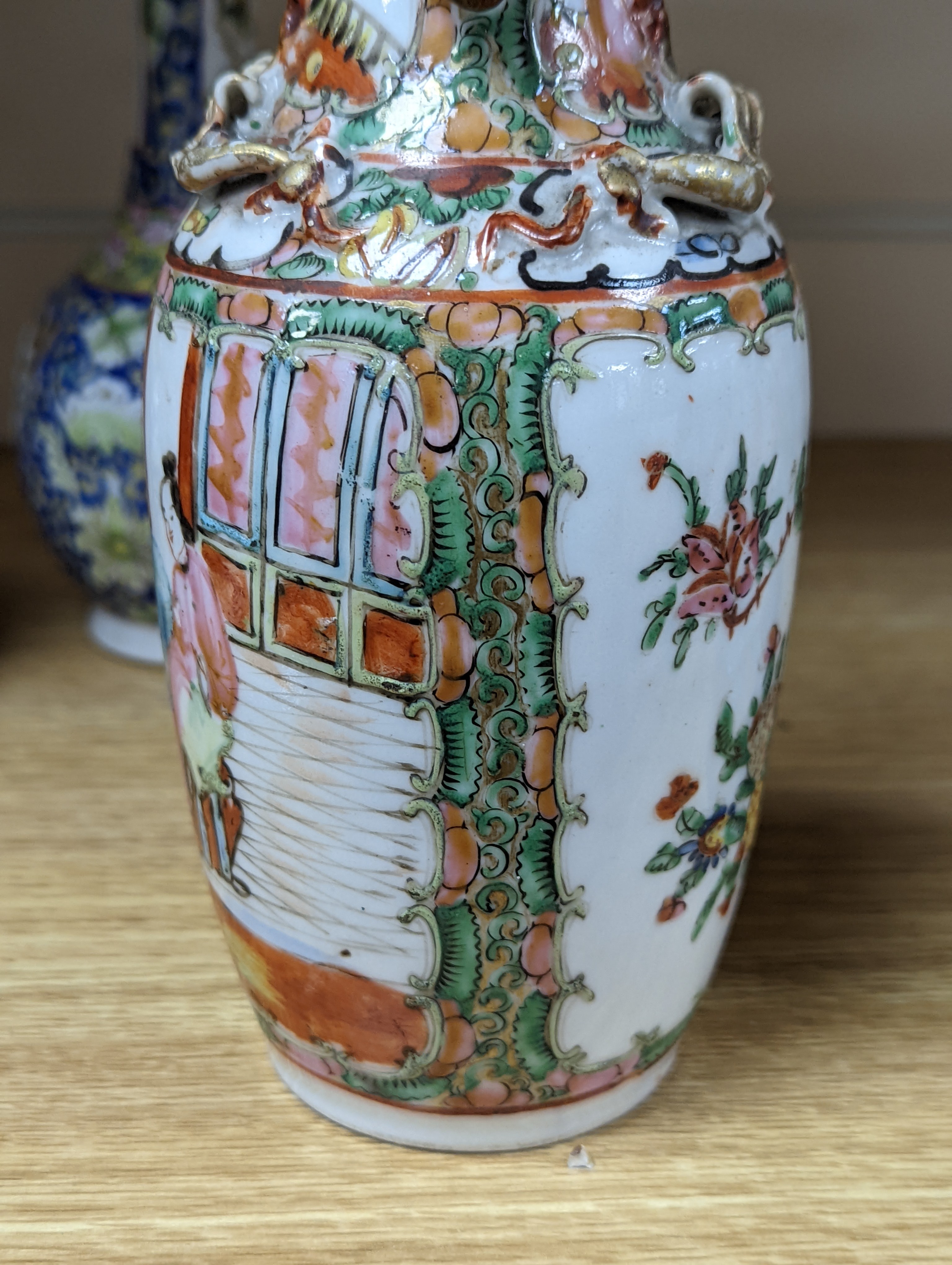 Four 19th century Chinese famille rose vases, 21cm